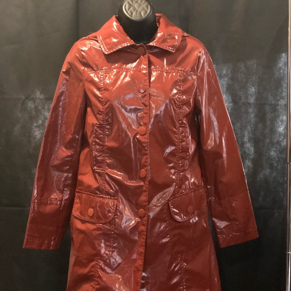 Worn Red Raincoat